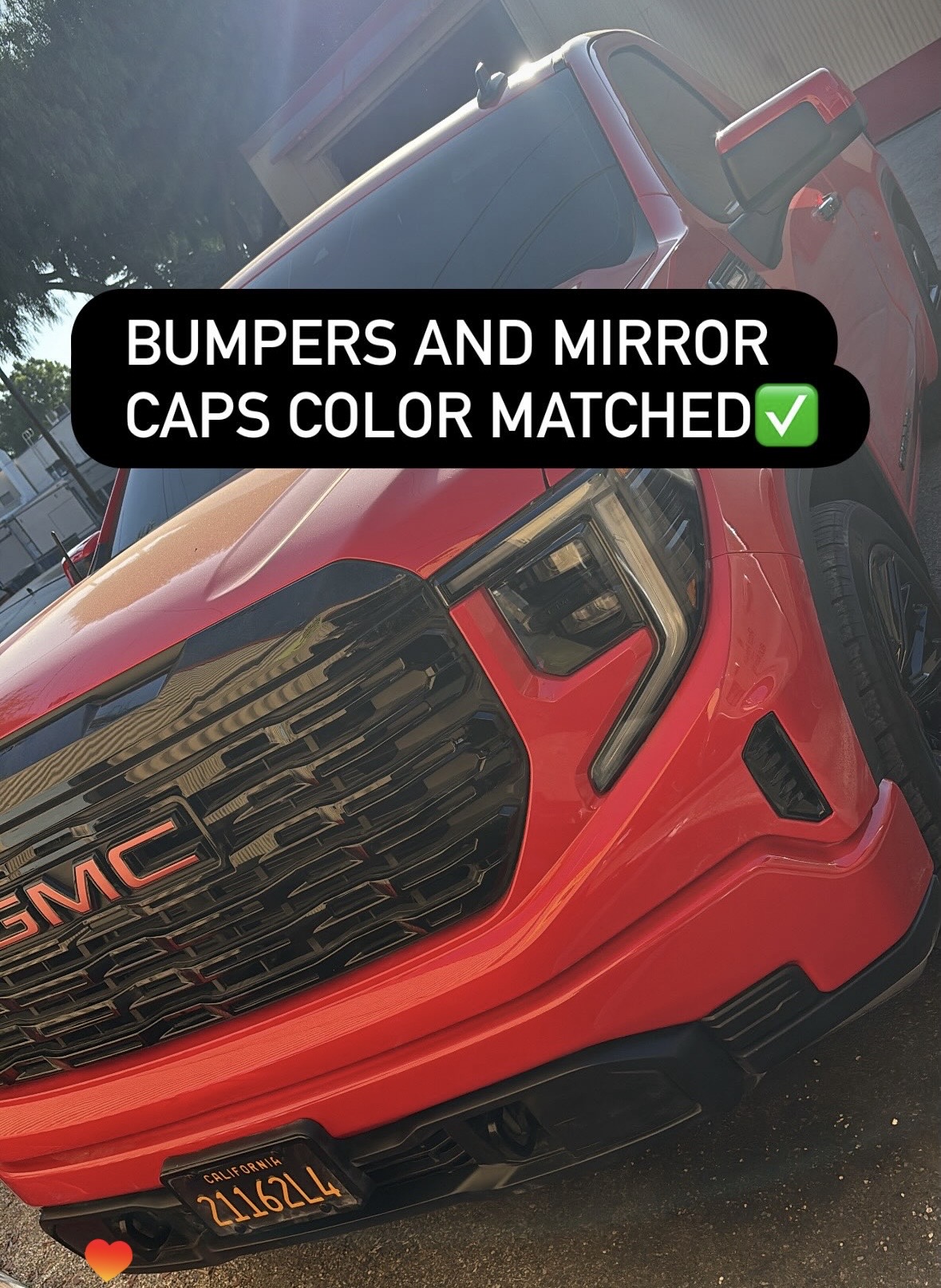 GMC with color-matched bumpers and mirror caps